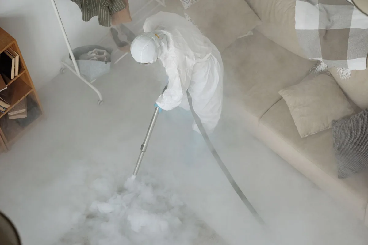 Biohazard cleanup technician in protective equipment, Pomonok / Electchester / Hillcrest, New York, NY